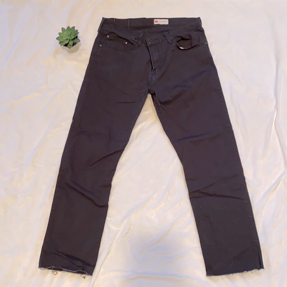 Distressed hem black wrangler jeans